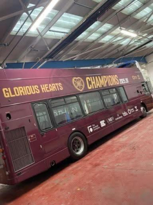 What goes beep, beep, beep, beep, beep? The Hearts open top  Champions bus reversing back into garage.